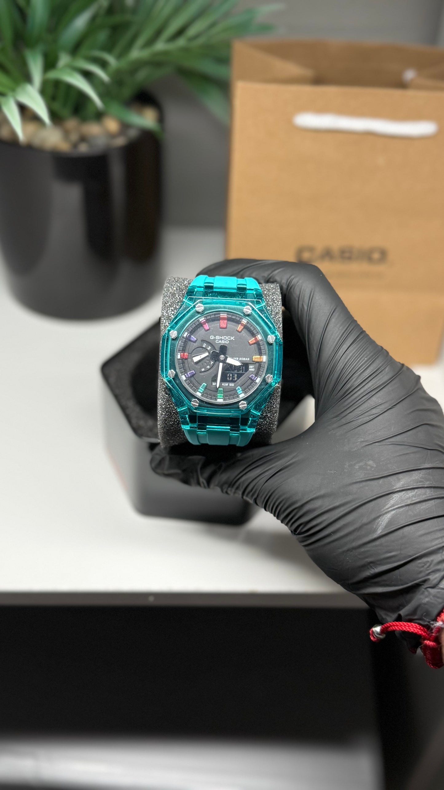 Teal green with rainbow face G Shock ￼