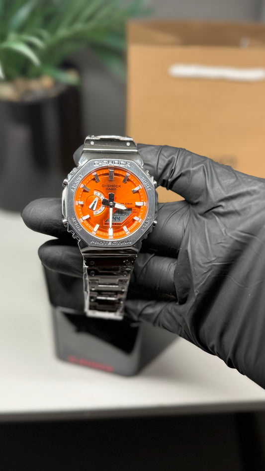 Silver metal orange face G shock ￼