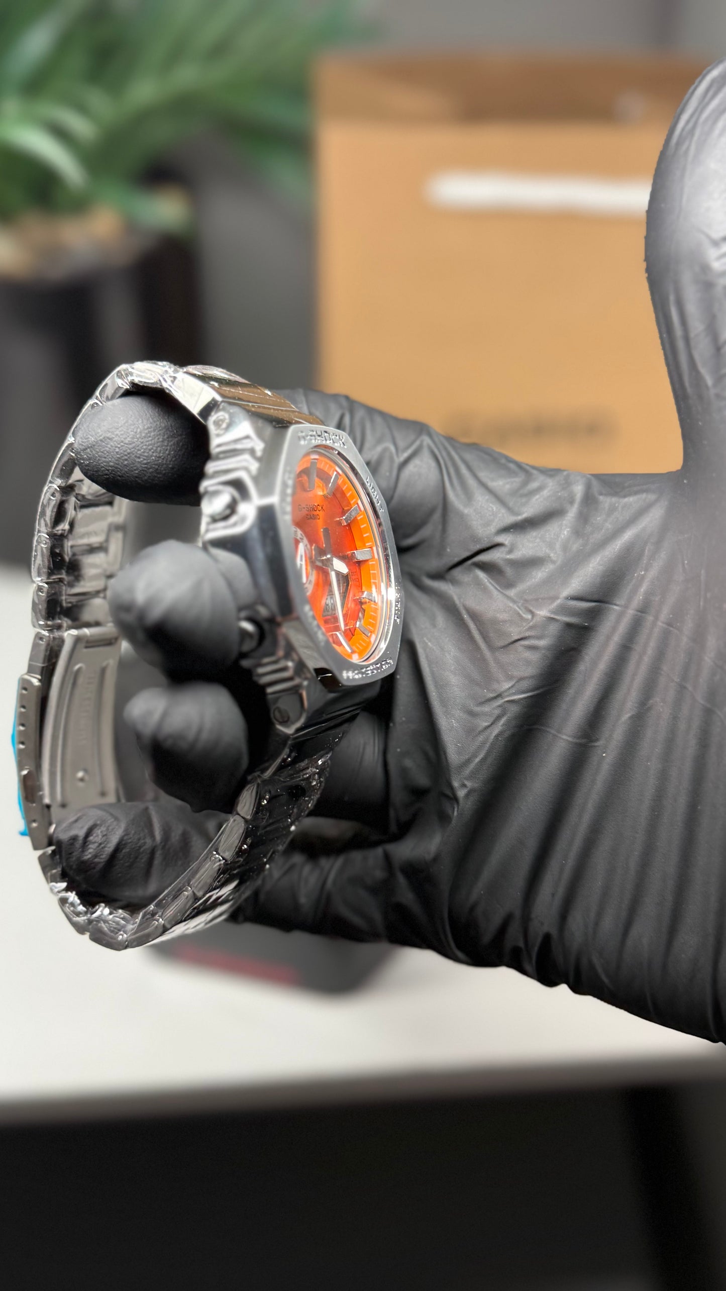 Silver metal orange face G shock ￼