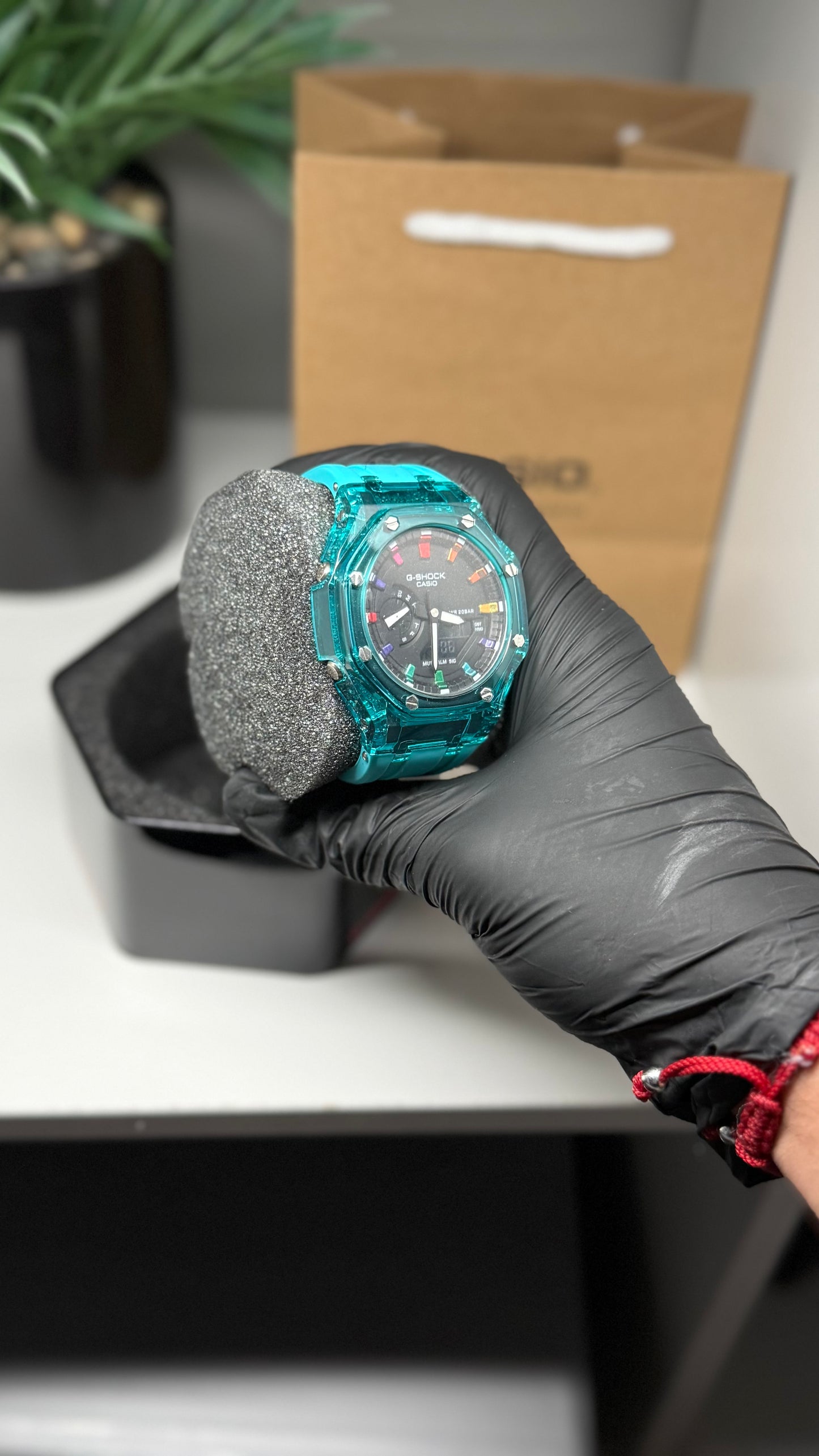 Teal green with rainbow face G Shock ￼